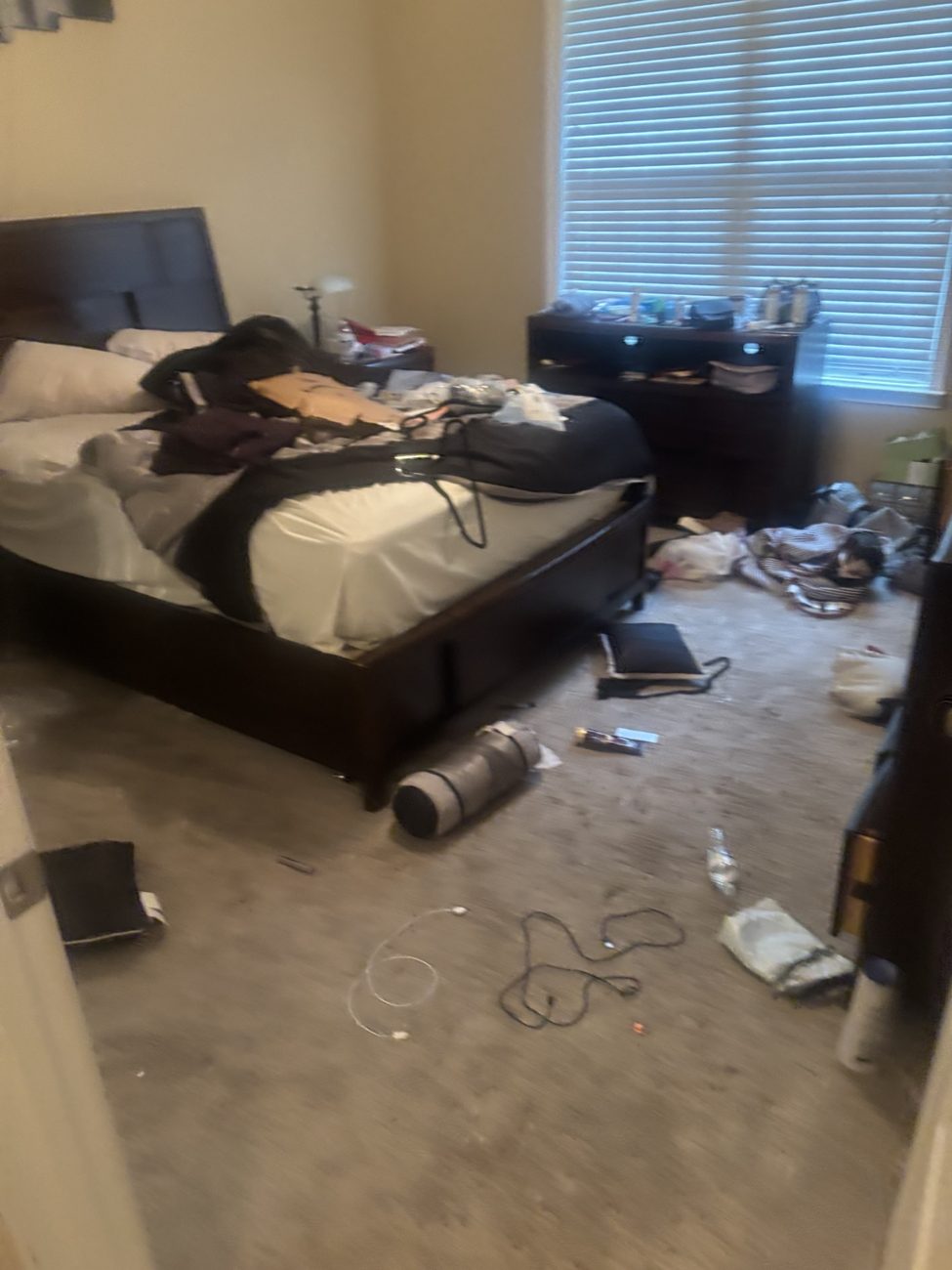 Bedroom before cleaning and tidying